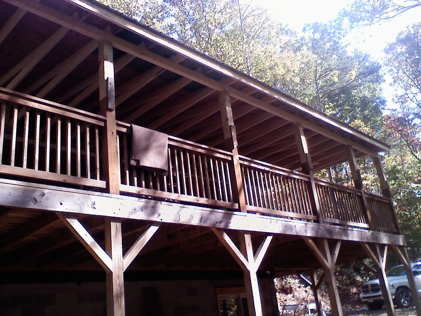 Timber framing under a new elevated porch and deck — Roof Leak Repair in Supply by Roofing Brothers